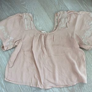 Loose, pink tee shirt